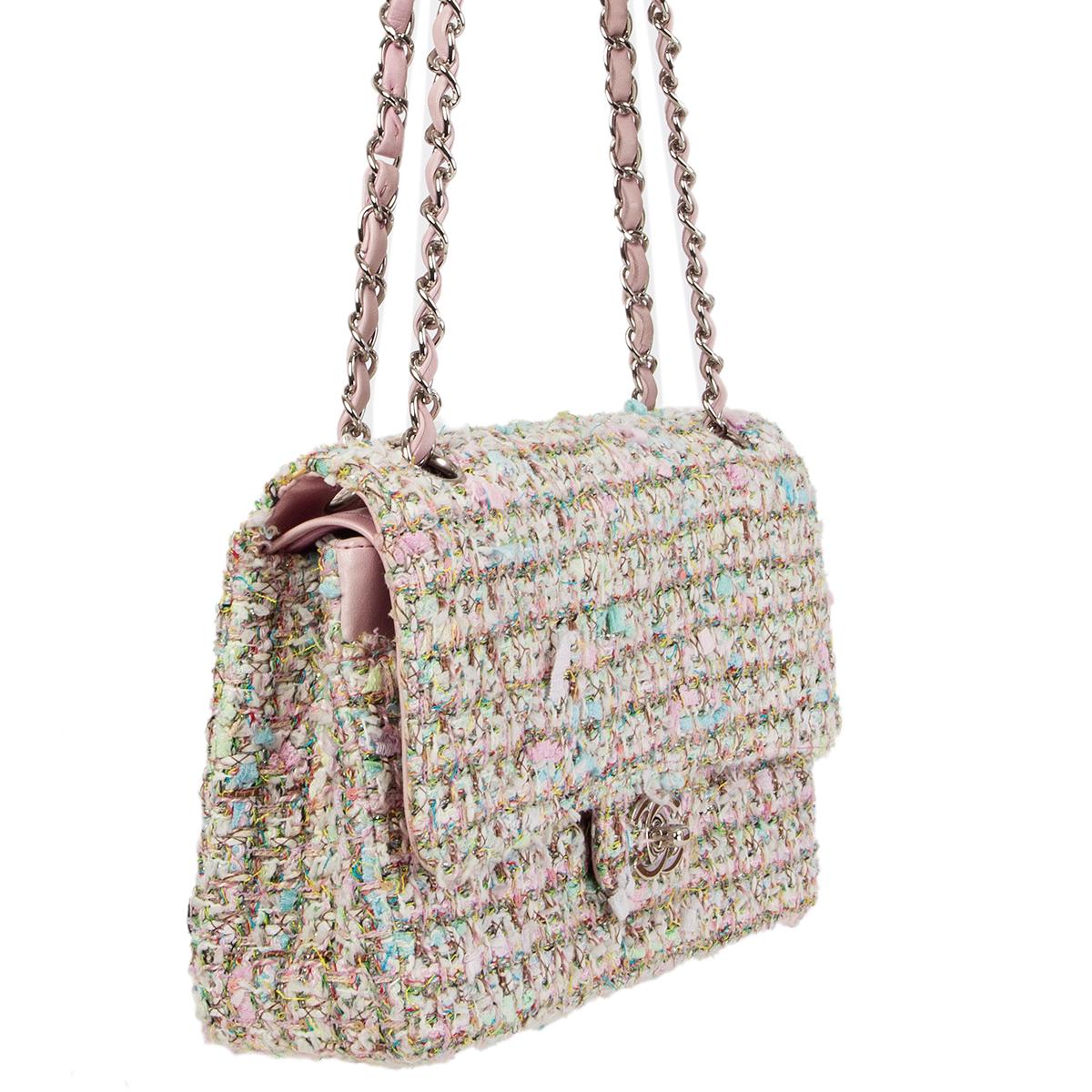 Chanel 'Timeless Classic Medium' flap bag in pink, pistachio green and mutlicolor boucle tweed. Open pocket on the outside back and on the front under the flap. Zip pocket in the flap. Lined in baby pink leather with two open and a lipstick pocket