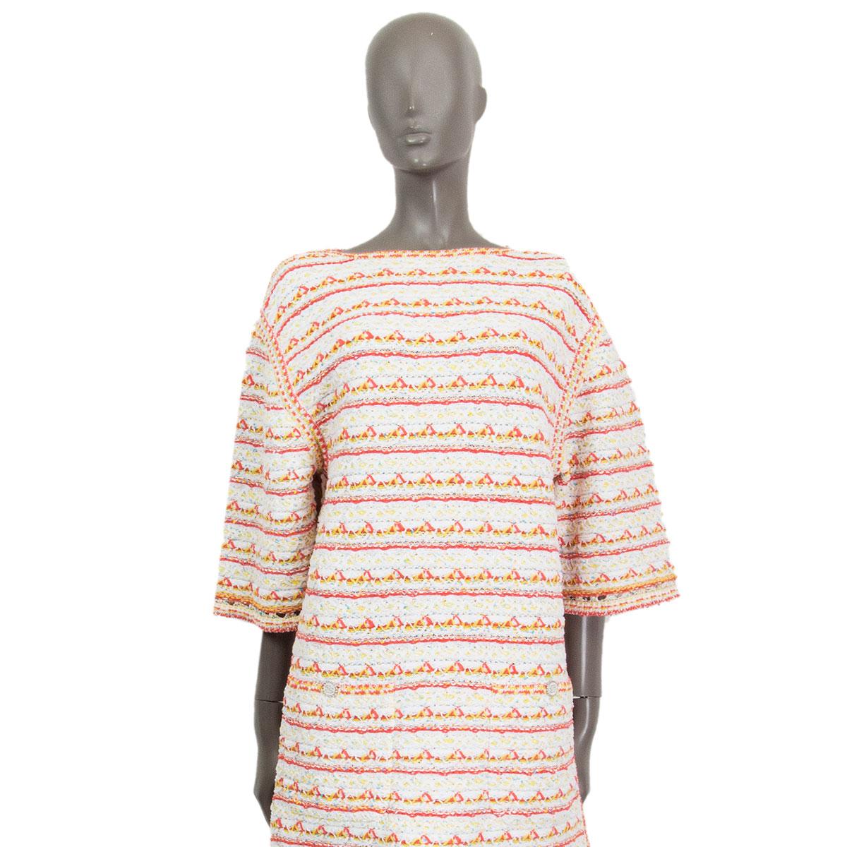 100% authentic Chanel 2019 short sleeve shift  dress in white, coral, yellow and blue polyamide (41%)  cotton (40%) silk (7%) viscose (7%) paper (5%). With a high adjustable side-zipper on the left side, drop-shoulders, crochet hem, two faux-pockets