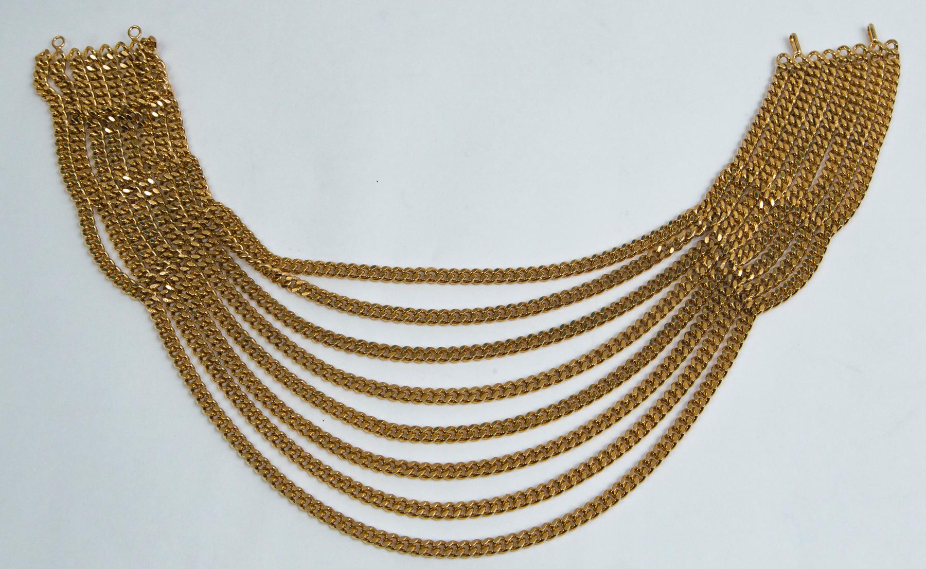 multiple gold necklaces