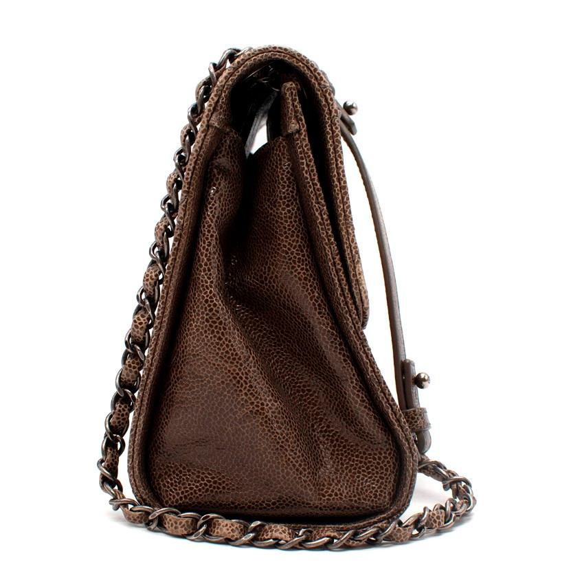 Chanel Mushroom Brown Quilted Textured Caviar Leather Shoulder Bag
 

 - Textured caviar calfskin leather in rich mushroom brown hue
 - Signature diamond quilted outer
 - Aged silver-tone hardware
 - Interlocking CC twistlock flap fastening
 - One