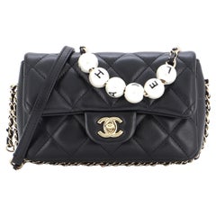 Chanel Pearl Flap Bag - 46 For Sale on 1stDibs  chanel chic pearls flap  bag, chanel pearl crush bag, chanel mini pearl flap bag
