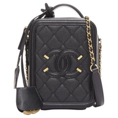 CHANEL N/S Waschtisch Vertikale schwarze filigrane Gold CC Logo kleine Umhängetasche