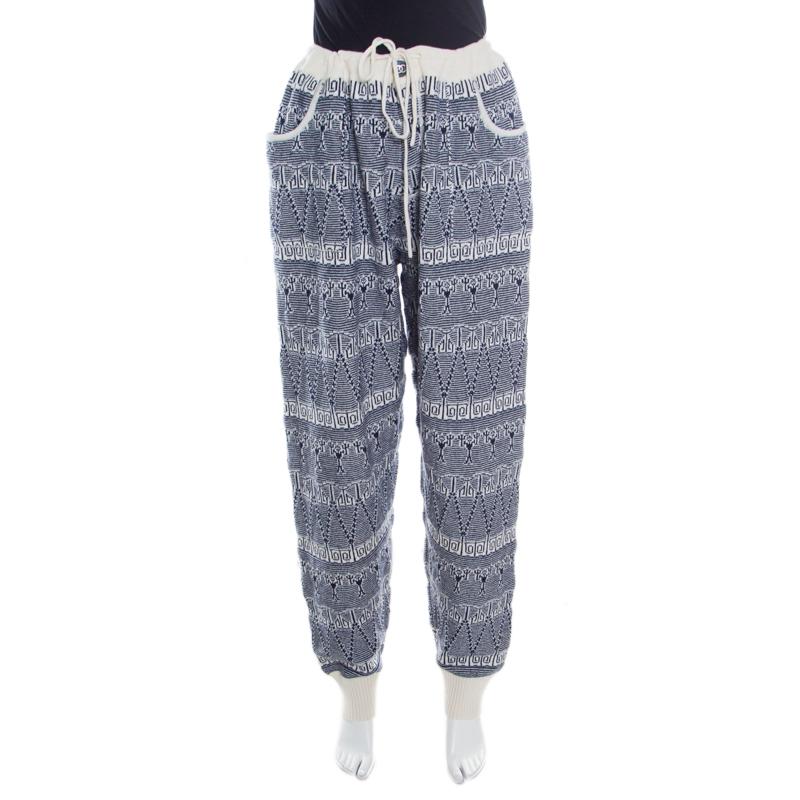 Made for movement, these jogger pants from the house of Chanel are not just your regular workout piece but can be sported with equal style for casual outings, as well. They feature a chic style couple with a comfortable silhouette. They are crafted