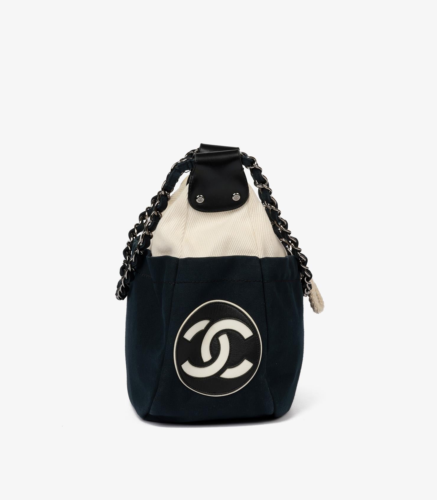 Women's or Men's Chanel Navy, Beige Canvas & Black Quilted Lambskin Cruise Timeless Hobo Bag For Sale