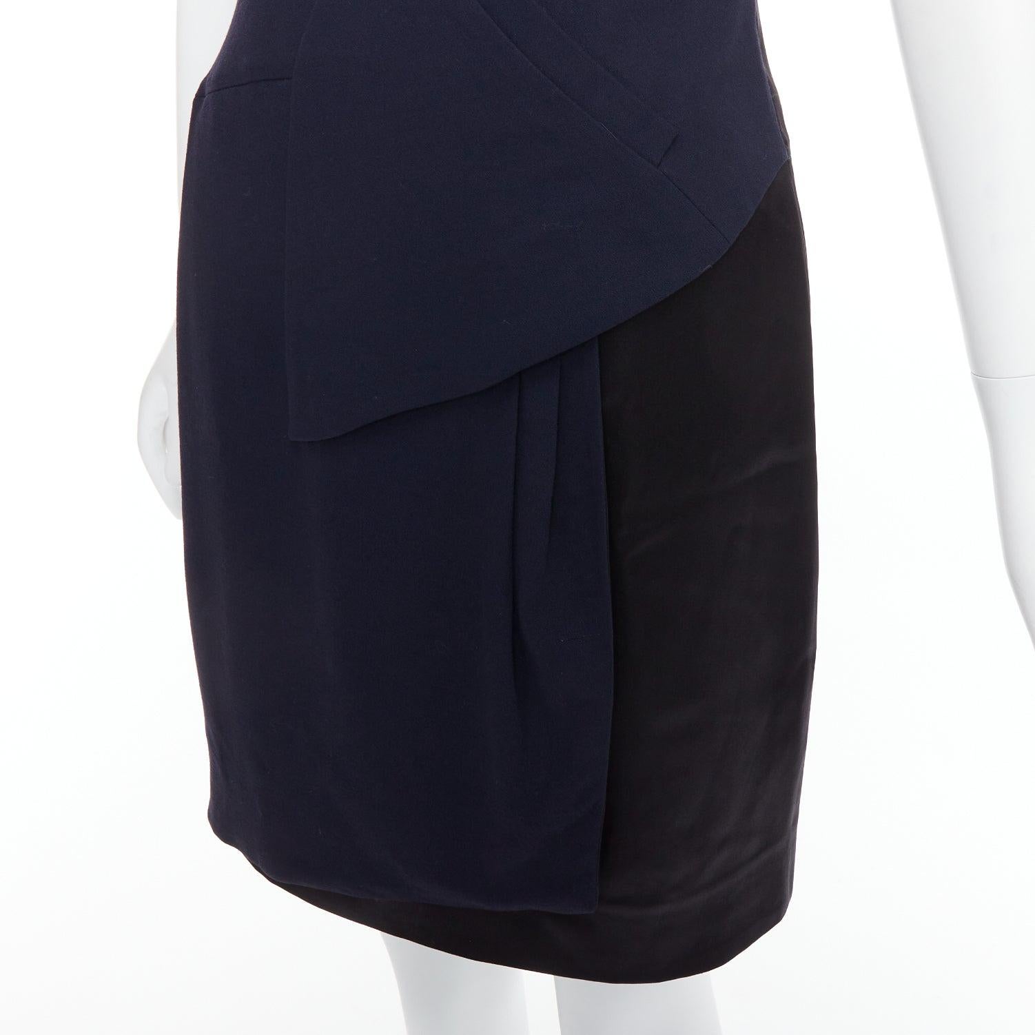 CHANEL navy black rayon wool blend draped pleated shift dress FR36 S
Reference: TGAS/E00532
Brand: Chanel
Designer: Karl Lagerfeld
Material: Rayon, Blend
Color: Black
Pattern: Solid
Closure: Zip
Lining: Black Fabric
Extra Details: Navy blue/black.