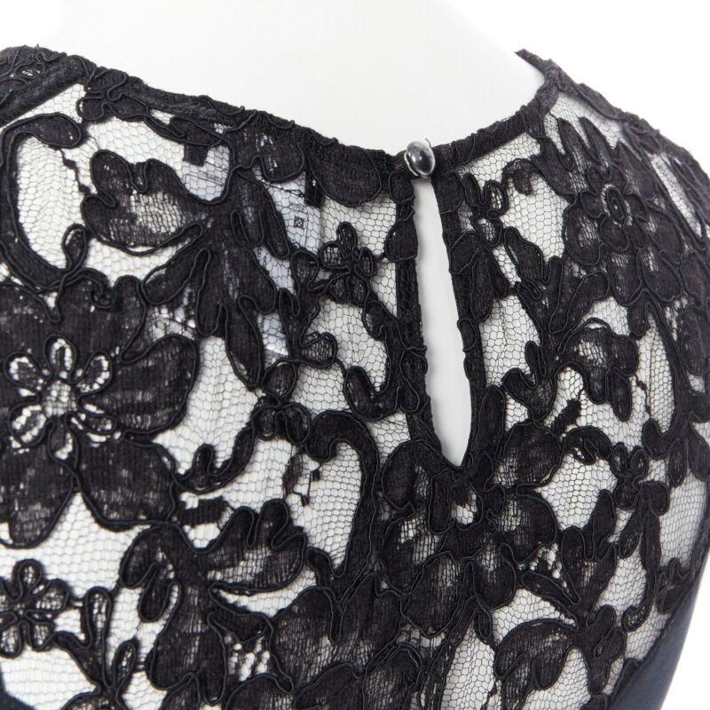 CHANEL navy blue 100% cotton illusion neckline black lace sleeveless top FR36
Reference: LNKO/A01146
Brand: Chanel
Designer: Karl Lagerfeld
Material: Cotton
Color: Blue
Pattern: Solid
Extra Details: Illusion neckline top. Sleeveless. Floral