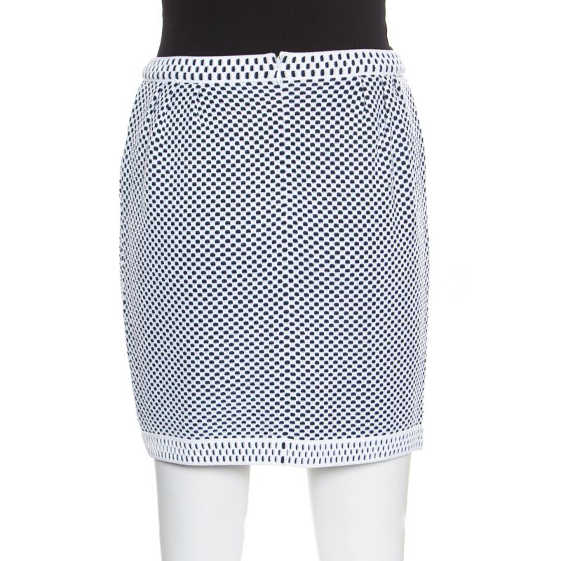 This mini skirt from Louis Vuitton is perfect for the minimalist you! The navy blue and white skirt is made of a viscose blend and features a jacquard knit pattern all over it. It comes equipped with a concealed zip closure at the back and is sure