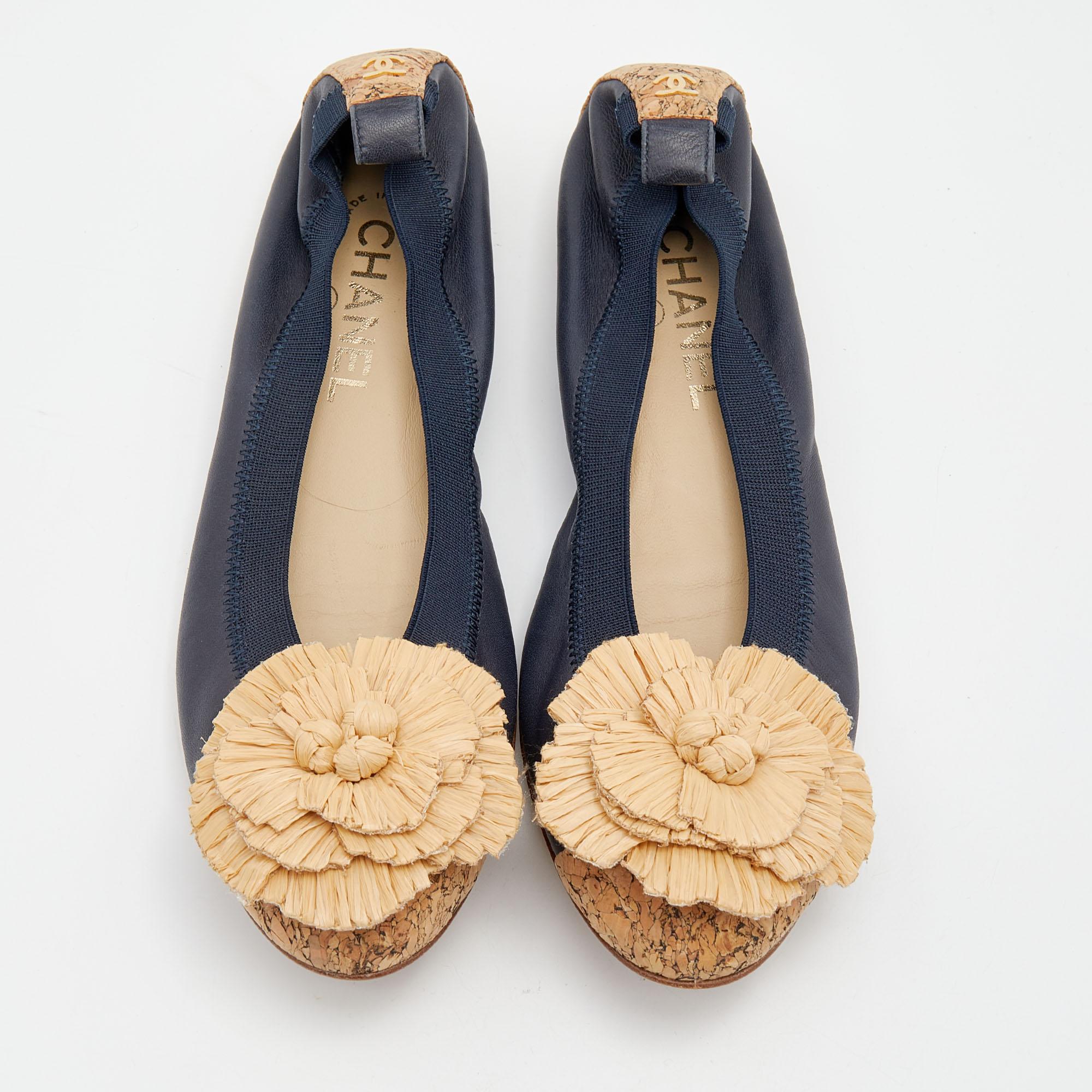 Adorning these Chanel scrunch ballets will give you an instant dose of contemporary cool. Covered in leather, they are decorated with the brand's signature Camellia flower in straw on the uppers.

