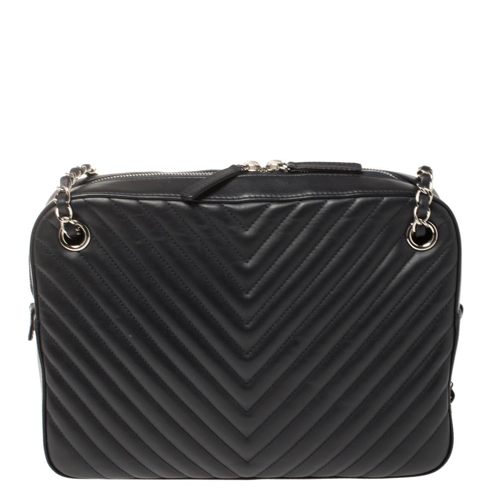 Phenomenal for its gorgeous design, this handbag from Chanel will raise your style quotient. On the front, there's a quilted Classic Flap with silver-tone hardware, while on the back, there is a much larger chevron-quilted compartment where you’ll