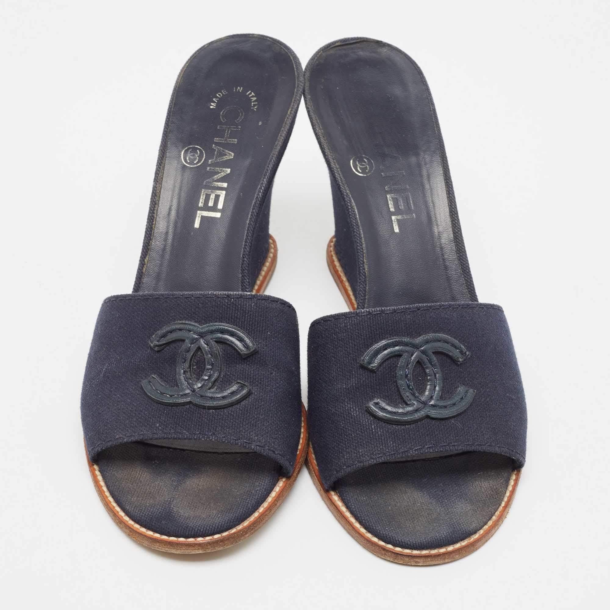 These timeless Chanel wedge slides for women are meant to last you season after season. They have a comfortable fit and high-quality finish.

Includes: Original Dustbag, Original Box

