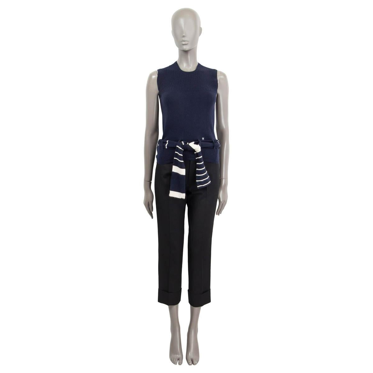 100% authentic Chanel sleeveless knit top in navy cashmere (100%). Features is a navy, black and off-white striped belt. Unlined. has been worn and is in excellent condition.

Chanel 2002

Measurements
Model	Chanel02C
Tag Size	38
Size	S
Shoulder