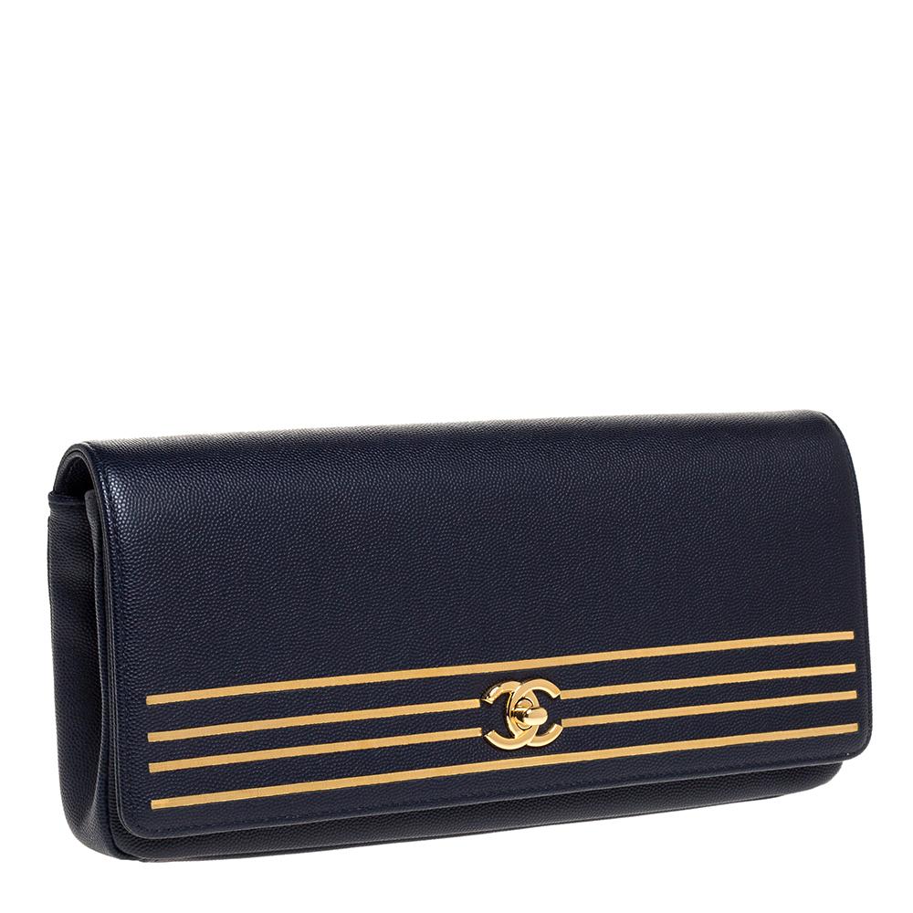 navy and gold clutch