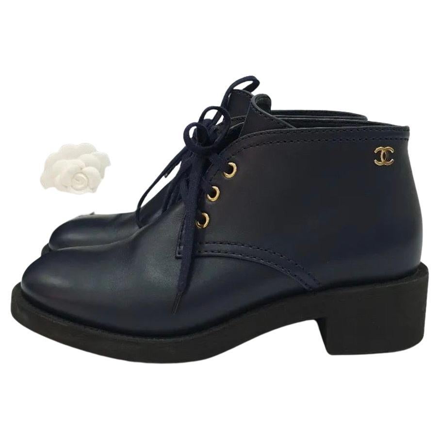 Chanel Navy Blue Leather CC logo Lace Up Booties For Sale at 1stDibs