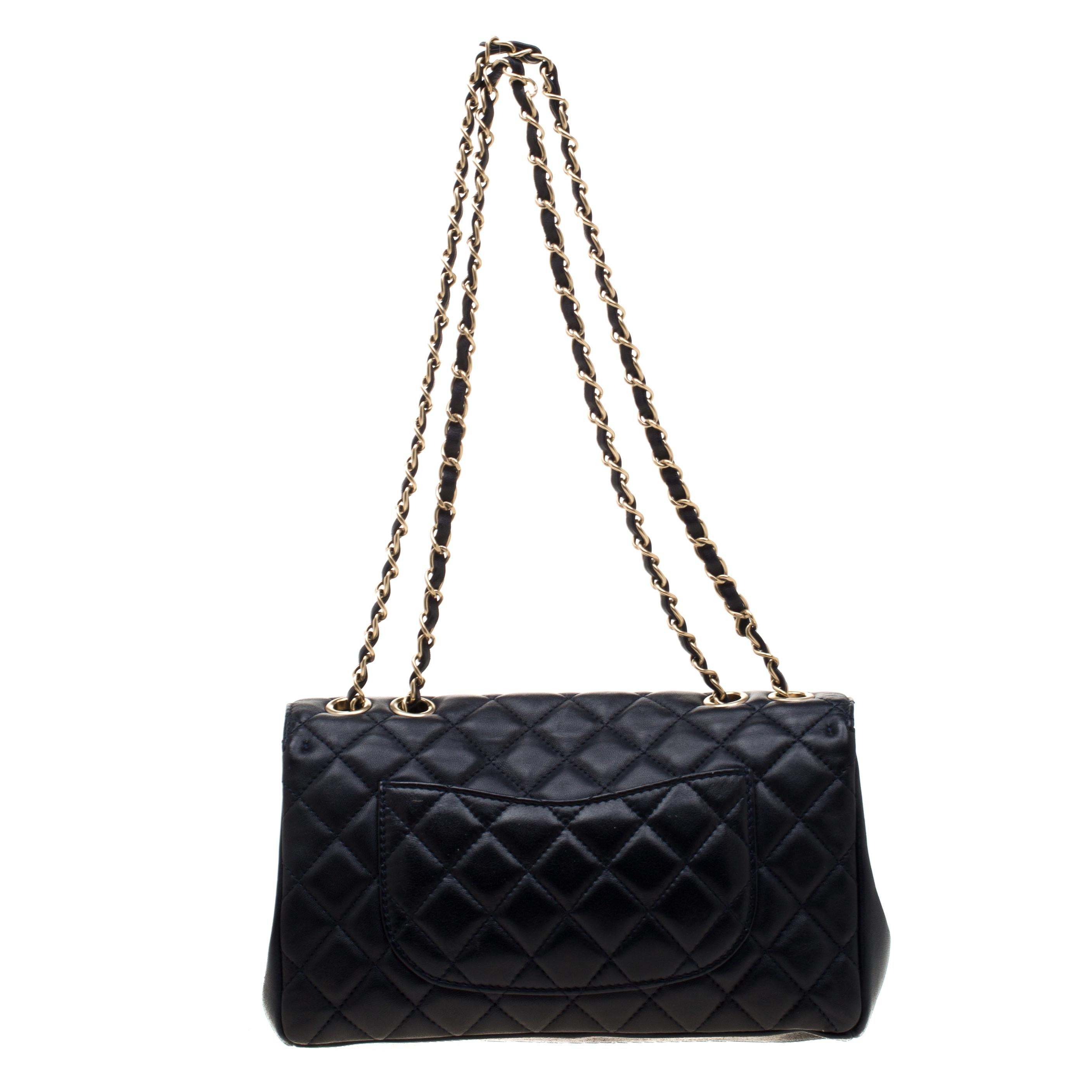 Masterfully crafted from quality leather, this shoulder bag from Chanel will effortlessly hold your essentials. It is covered in the brand's signature quilt and on the flap, the Mademoiselle lock sits beautifully. Created with luxury in mind, this