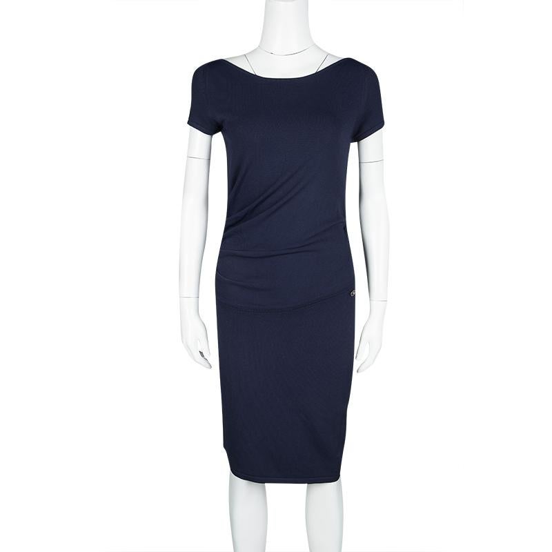 This navy blue dress from Chanel has gone through perfect tailoring and then designed to help you look classy. It carries short sleeves, subtle ruched details, and a boat neck.

Includes: Packaging