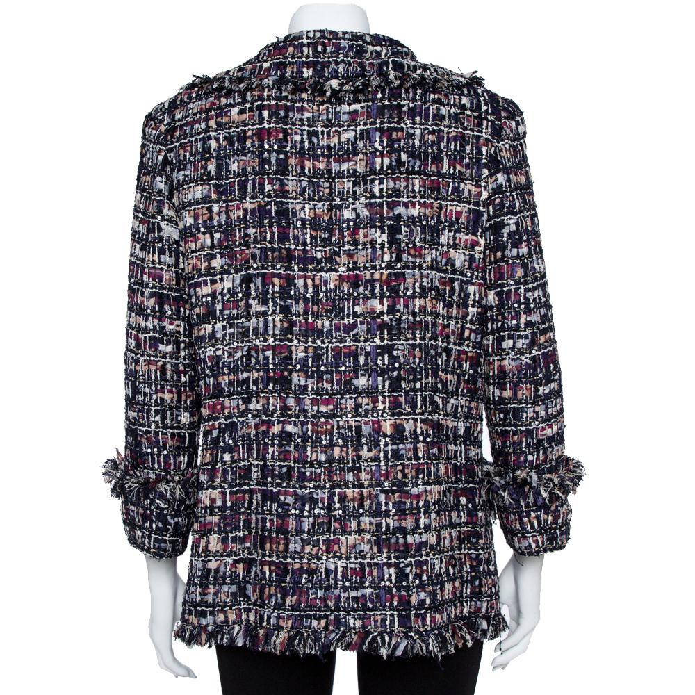 Creations from Chanel leave no stone unturned for us to get impressed and this jacket does the same! The navy blue tweed creation features wide collars, embellished front button fastenings, and long sleeves, It is sure to lend you a great fit and