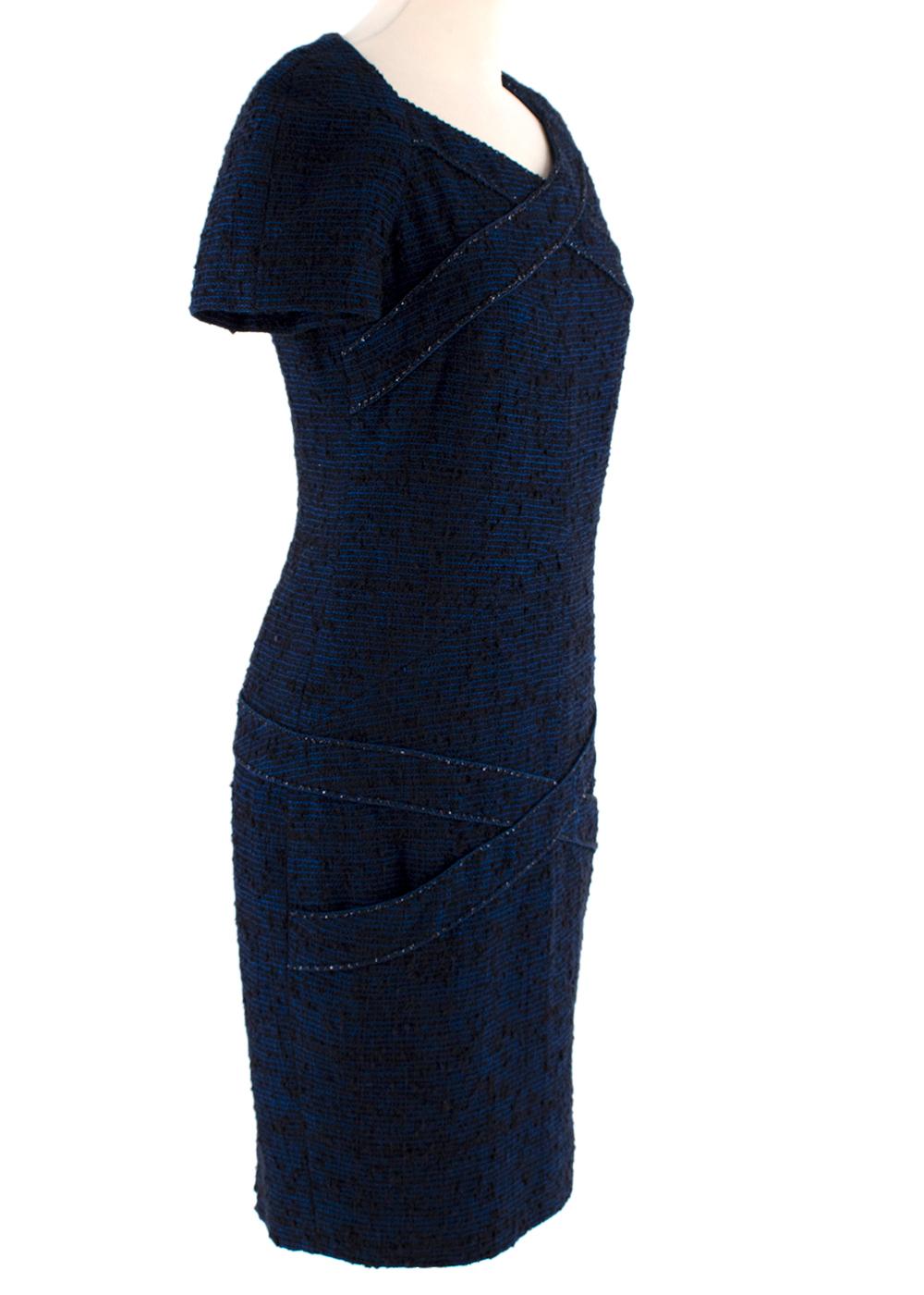Chanel Navy Boucle Woven Alpaca Blend Pencil Dress

 Iconic Chanel design rendered in soft, feminine soft pink tones

-Short sleeve navy blue fitted dress with a stitch cross over detail and a subtle metallic thread running along the seam line