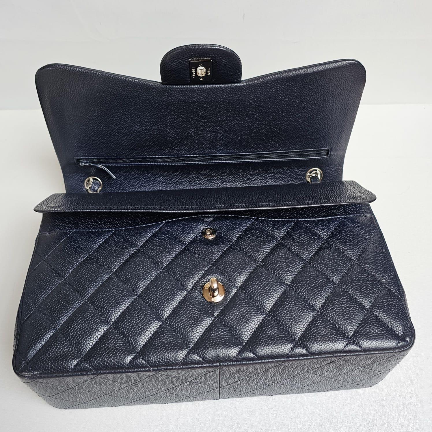 Women's or Men's Chanel Navy Caviar Leather Quilted Jumbo Double Flap Bag For Sale