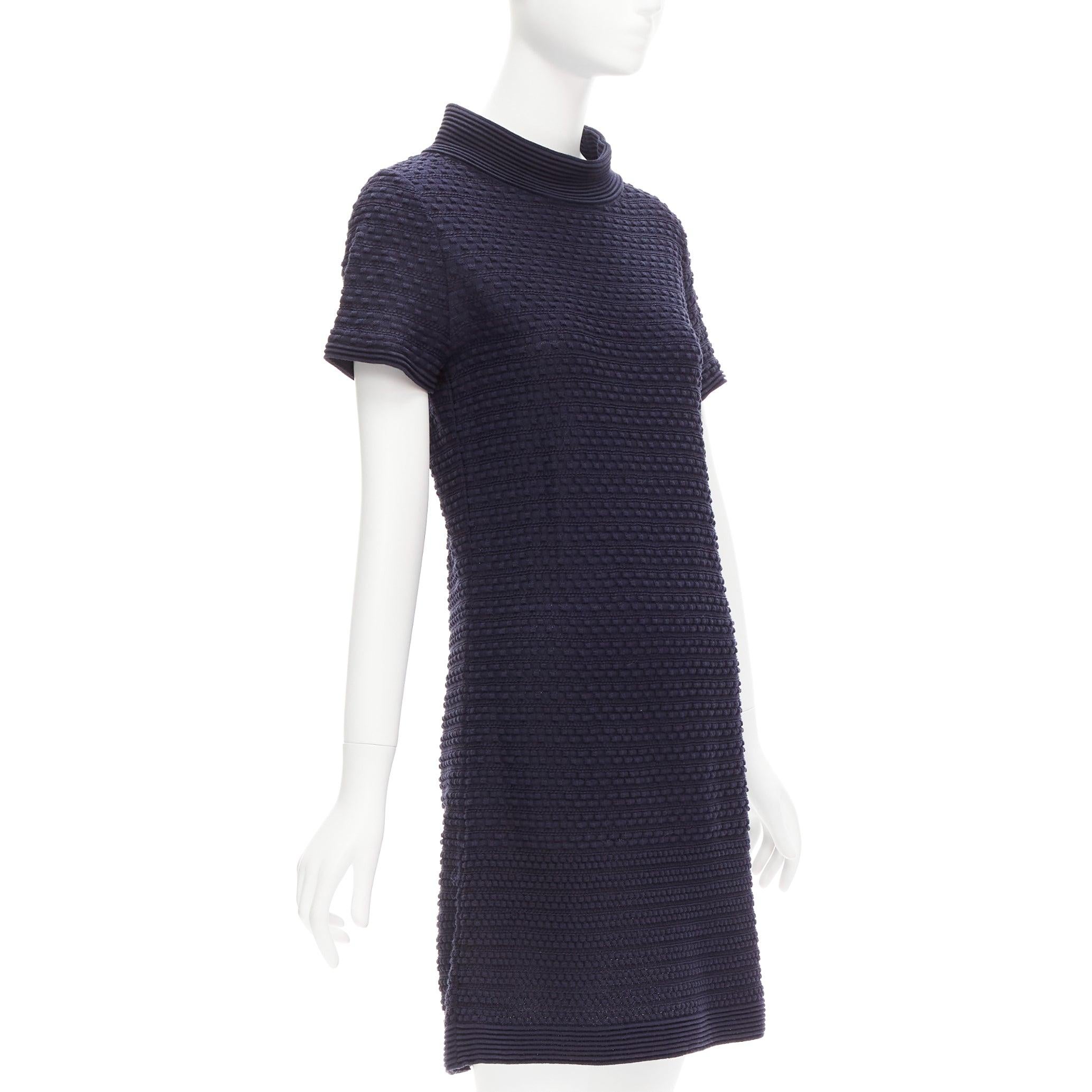 CHANEL navy CC logo button boat neck A-line knit mini dress FR38 M
Reference: TGAS/D00939
Brand: Chanel
Material: Cotton, Blend
Color: Navy
Pattern: Solid
Closure: Slip On
Made in: France

CONDITION:
Condition: Excellent, this item was pre-owned and