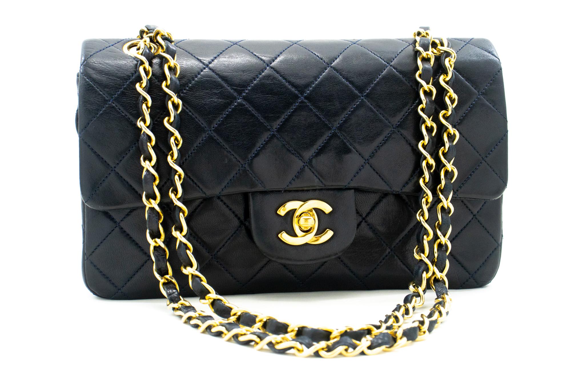 An authentic CHANEL NAVY Classic Double Flap 9