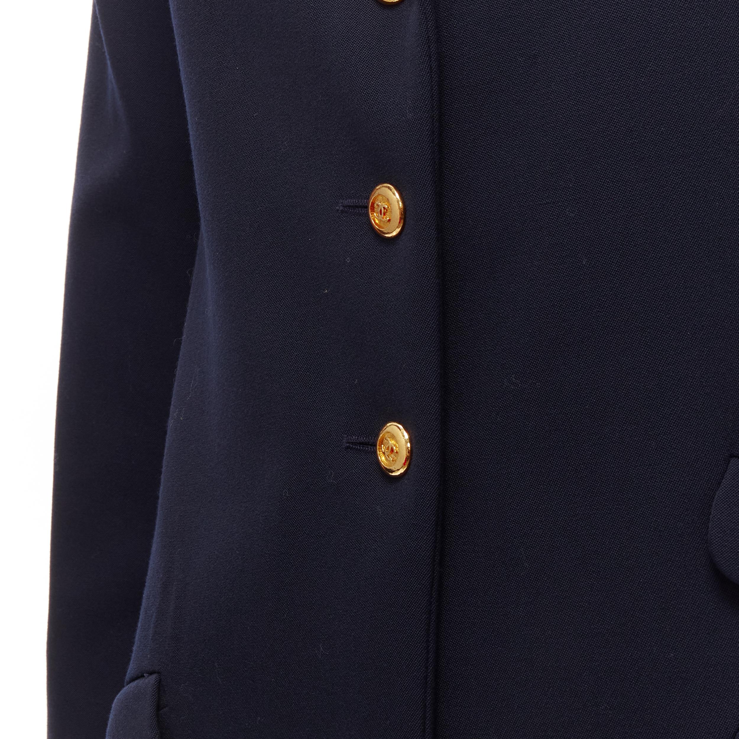 CHANEL navy gold CC buttons flap pockets military blazer jacket FR38 M
Reference: LNKO/A02112
Brand: Chanel
Designer: Karl Lagerfeld
Material: Feels like wool
Color: Navy, Gold
Pattern: Solid
Closure: Button
Lining: Navy Silk
Extra Details: CC logo