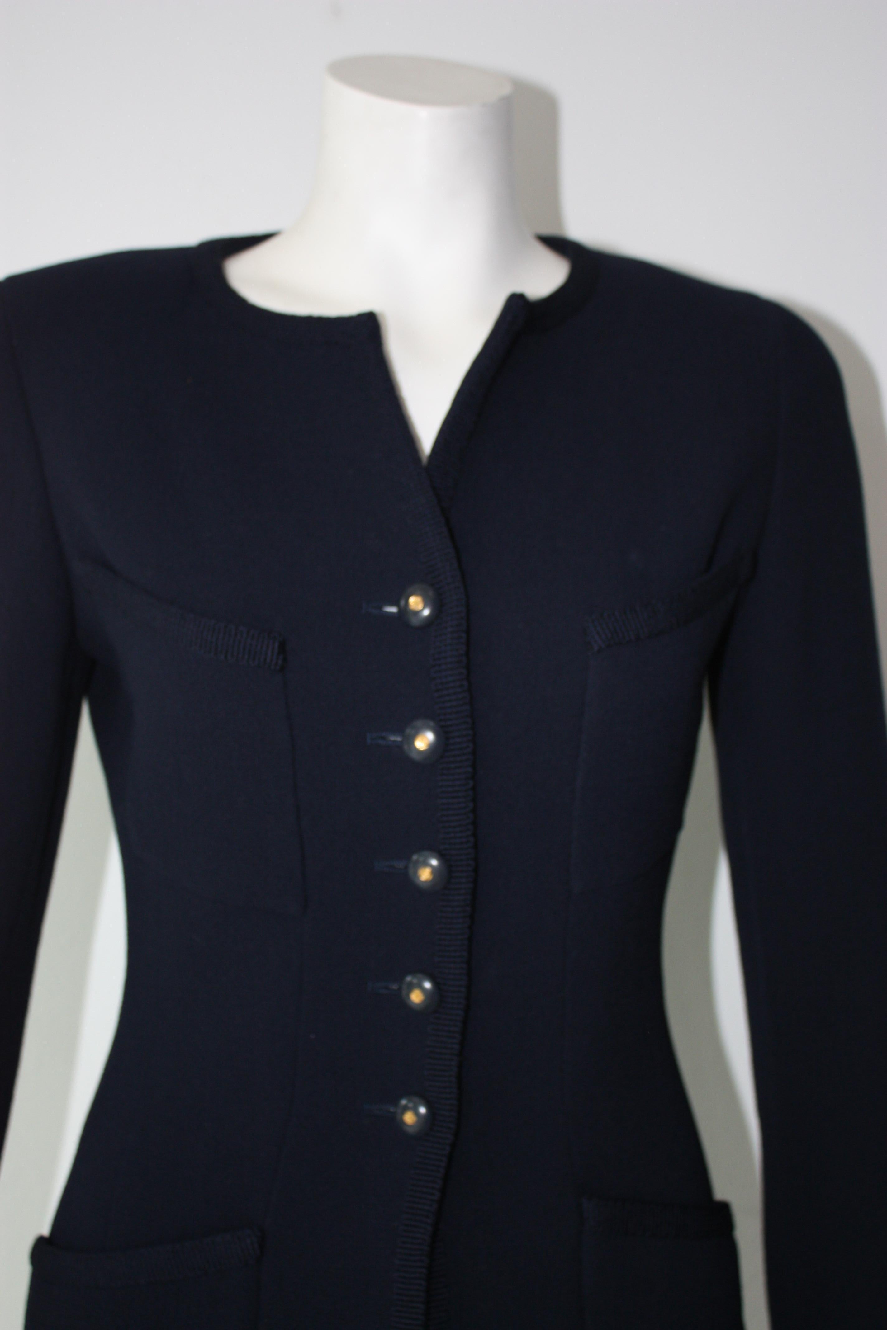 CHANEL Navy Jacket 
Vintage
Last half of the tag is ripped off 
Size appears to be a 38/40 
Beautiful Jacket, just minor imperfections and wear at some of the seams. 