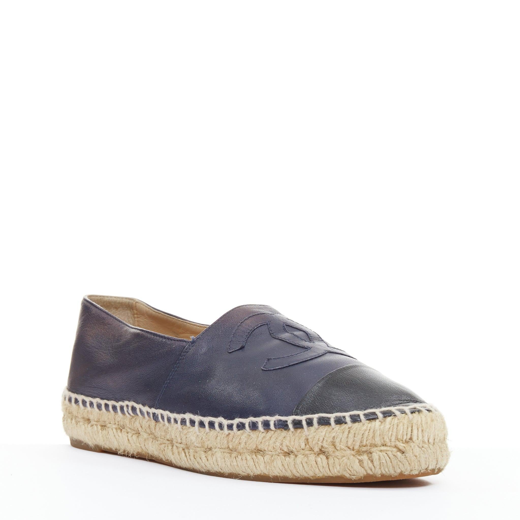 CHANEL navy lambskin leather CC logo applique jute espadrille shoes EU37
Reference: CNPG/A00149
Brand: Chanel
Material: Leather
Color: Navy, Beige
Pattern: Solid
Closure: Slip On
Lining: Nude Leather
Extra Details: Chanel Leather Espadrilles in navy