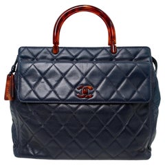 Chanel Navy Lambskin Quilted Leather Tortoise Top Handle Bag circa 1996