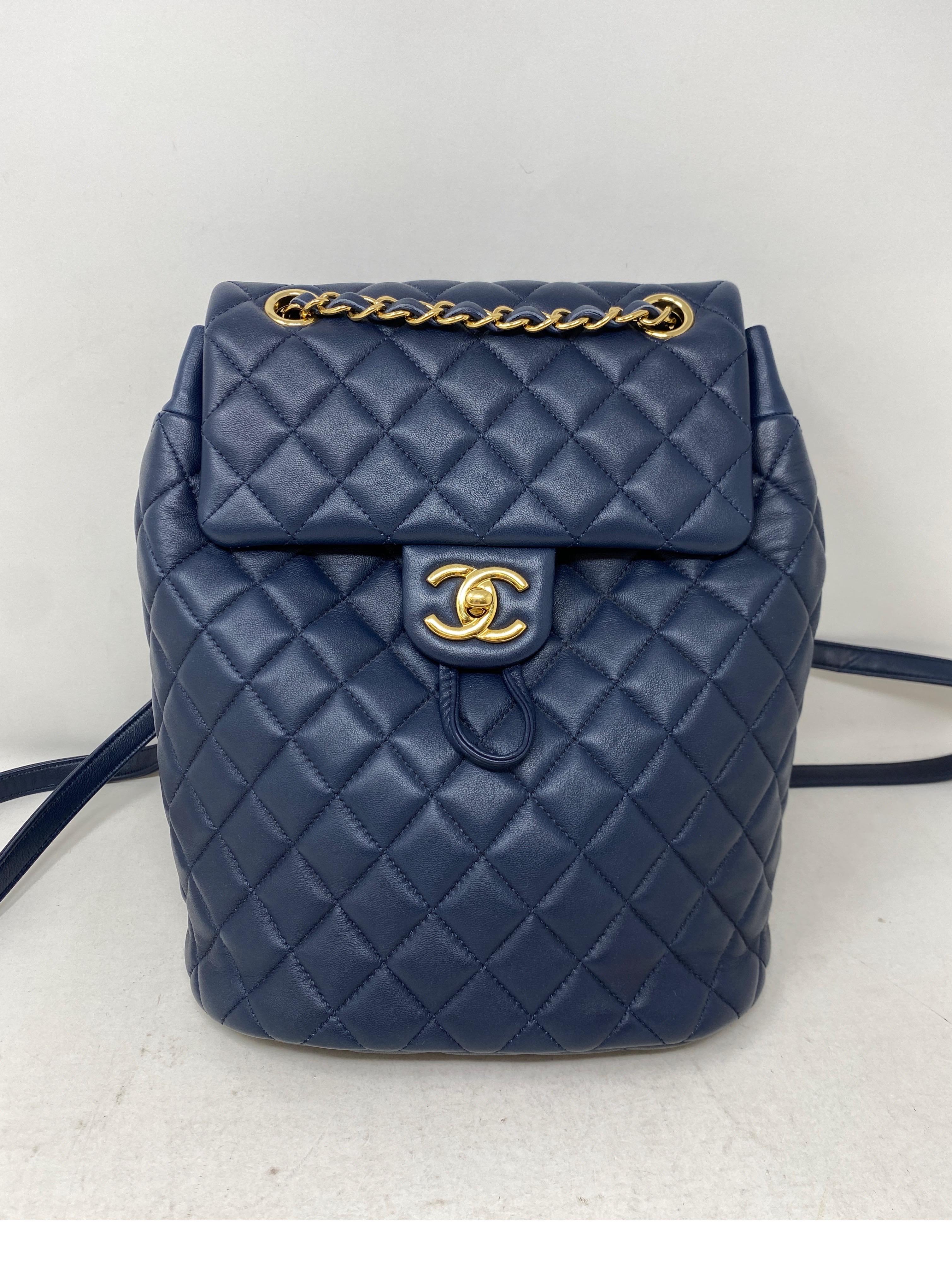 Chanel Navy Leather Backpack. Excellent like new condition. Gold hardware. Beautiful blue navy leather. Medium size backpack. Easy to carry. Serial number intact inside bag. Guaranteed authentic. 