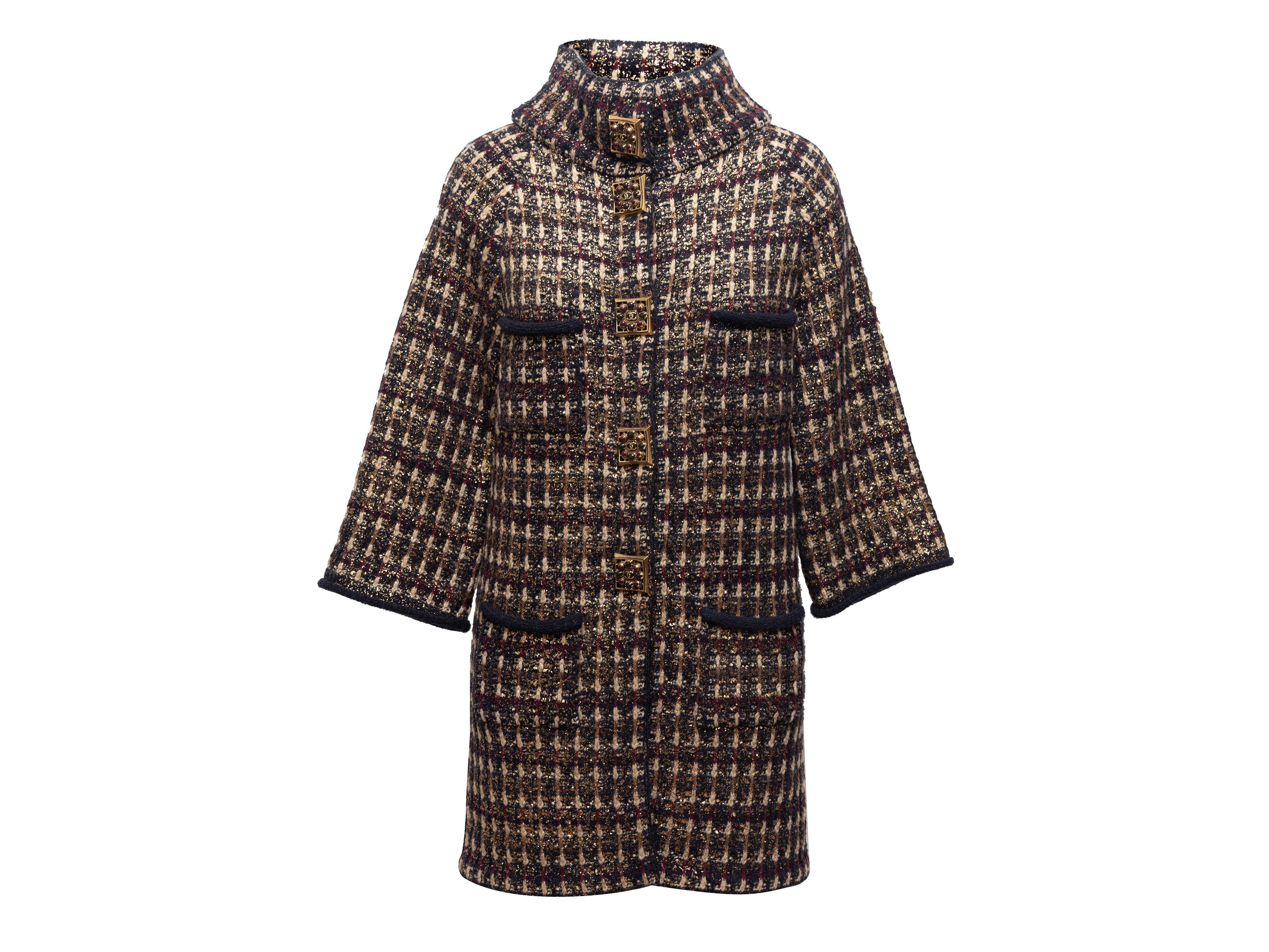 Product Details: Navy, maroon, and multicolor wool and cashmere-blend tweed coat by Chanel. From the Pre-Fall 2011 Paris-Byzane Collection. Stand collar. Four patch pockets at front. Gripoix button closures at center front. Designer size 38. 36
