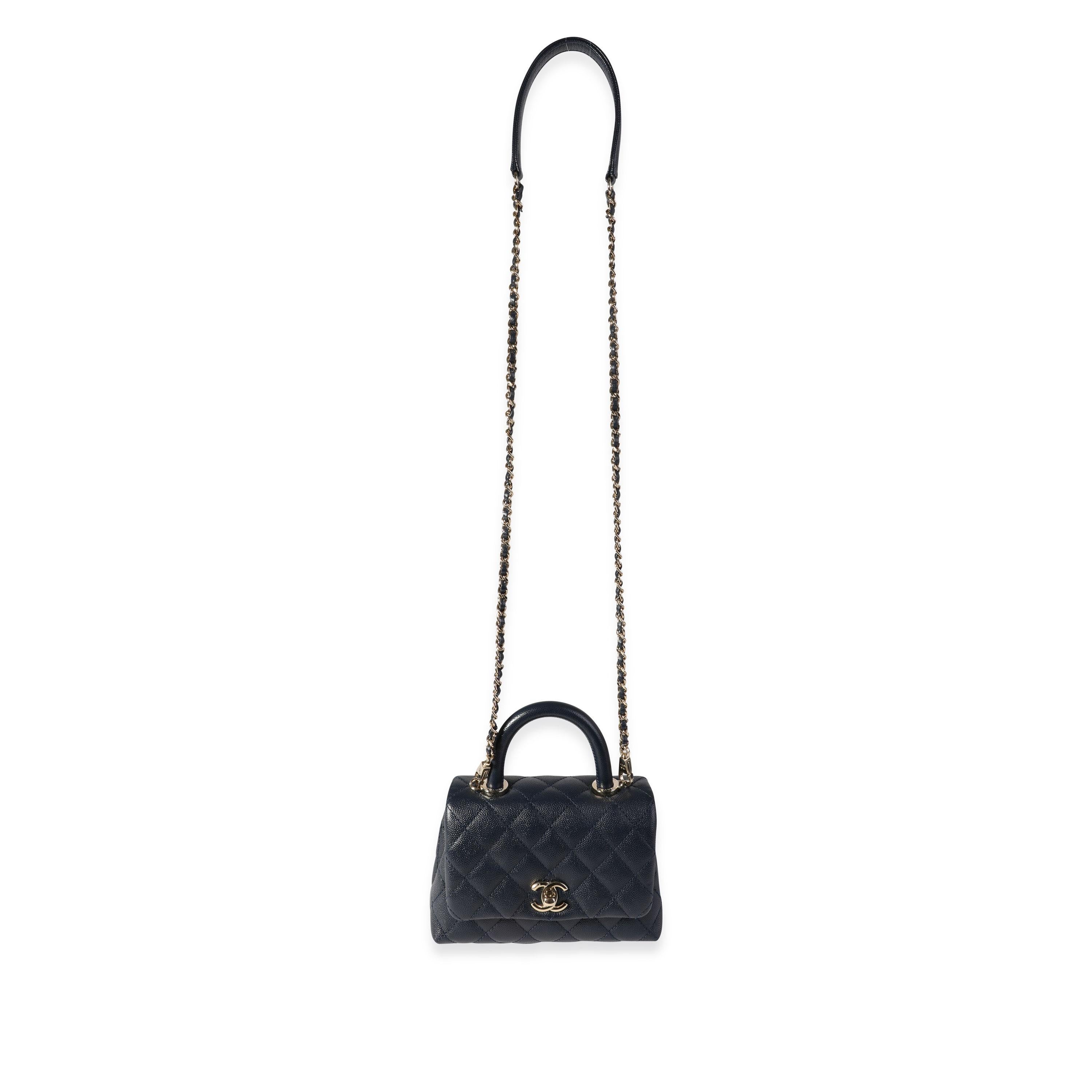 Listing Title: Chanel Navy Quilted Caviar Extra Mini Coco Top Handle Bag
SKU: 118641
Condition: Pre-owned (3000)
Handbag Condition: Excellent
Condition Comments: Excellent Condition. Plastic on some hardware. No visible signs of wear.
Brand: