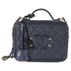 Chanel Navy Quilted Caviar Medium Filigree Case