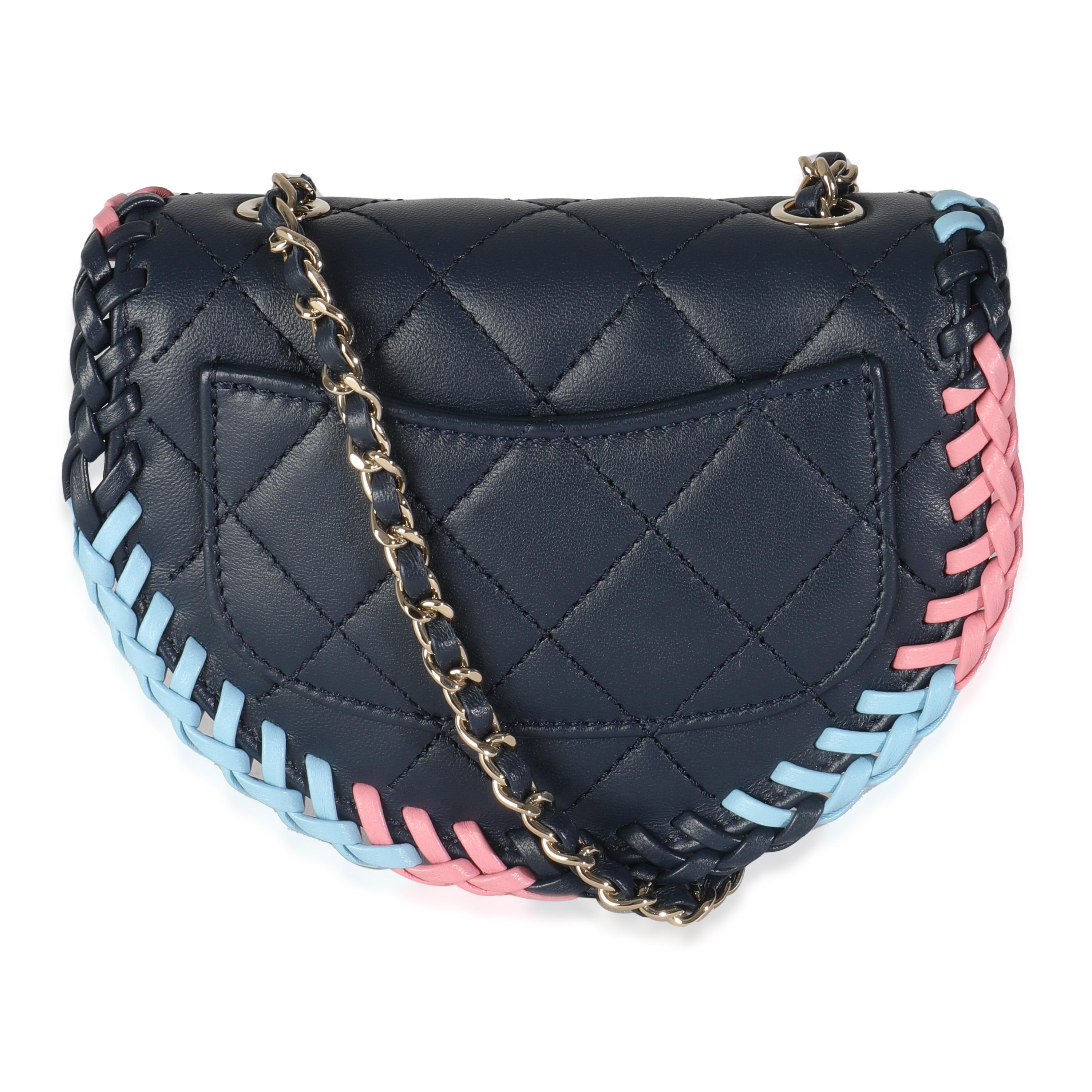Listing Title: Chanel Navy Quilted Lambskin Braided Mini Messenger Flap Bag
SKU: 144652
Condition: Pre-owned 
Condition Description: A timeless classic that never goes out of style, the flap bag from Chanel dates back to 1955 and has seen a number