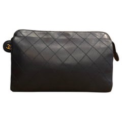 CHANEL Navy Quilted Lambskin Leather Clutch Bag
