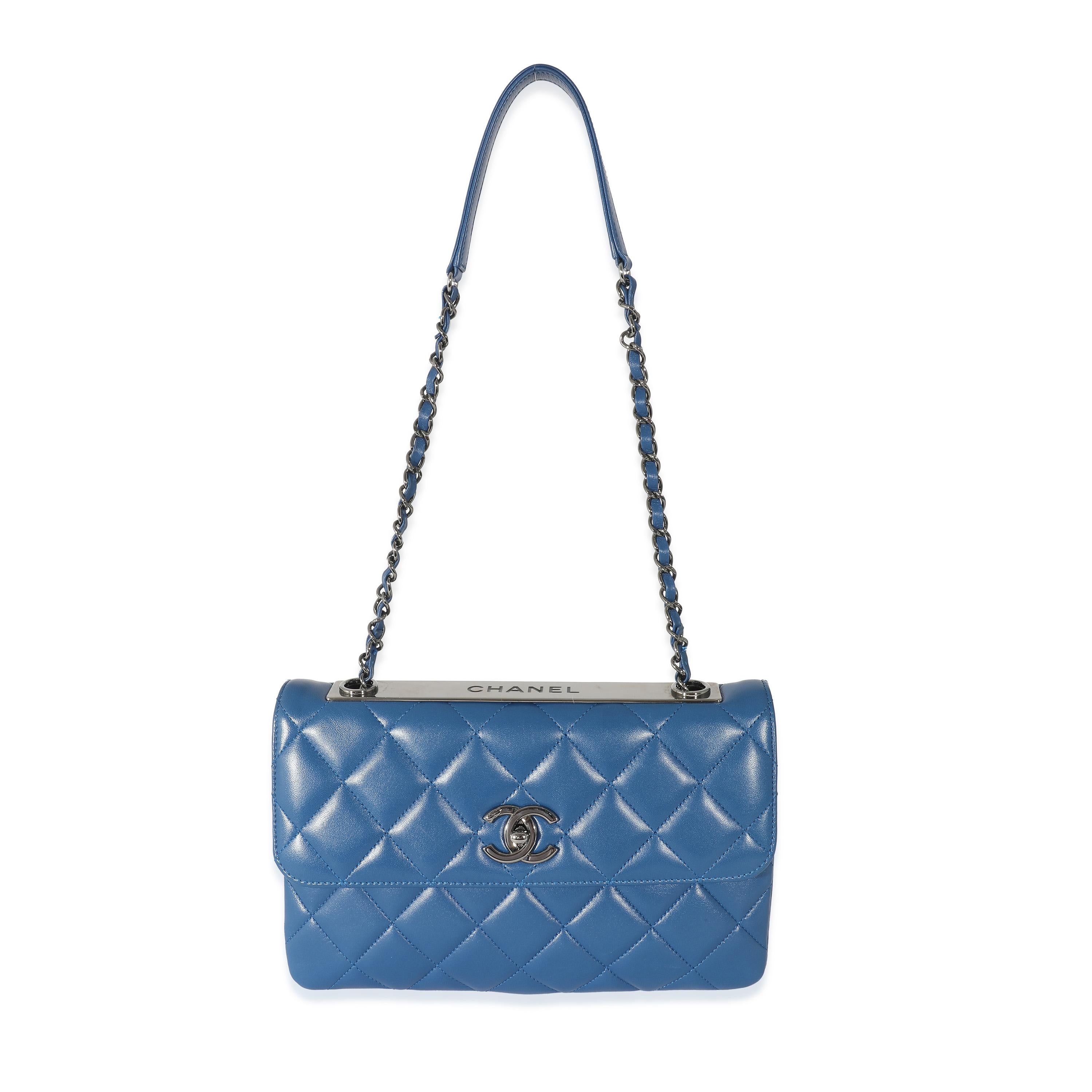 Listing Title: Chanel Navy Quilted Lambskin Medium Trendy CC Flap Bag
SKU: 133503
Condition: Pre-owned 
Handbag Condition: Very Good
Condition Comments: Item is in very good condition with minor signs of wear. Scuffing along corners and throughout