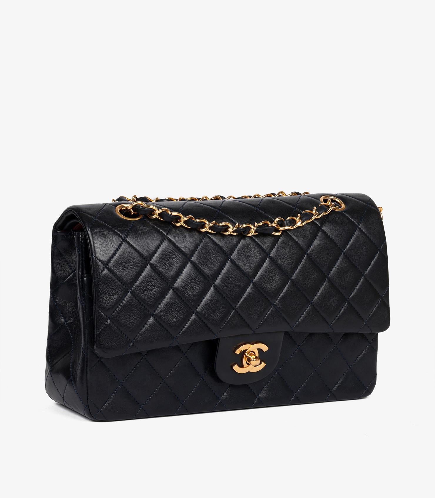 Chanel Navy Quilted Lambskin Vintage Medium Classic Double Flap Bag

Brand- Chanel
Model- Medium Classic Double Flap Bag
Product Type- Shoulder
Serial Number- 16*****
Age- Circa 1991
Accompanied By- Chanel Dust Bag, Authenticity Card
Colour-