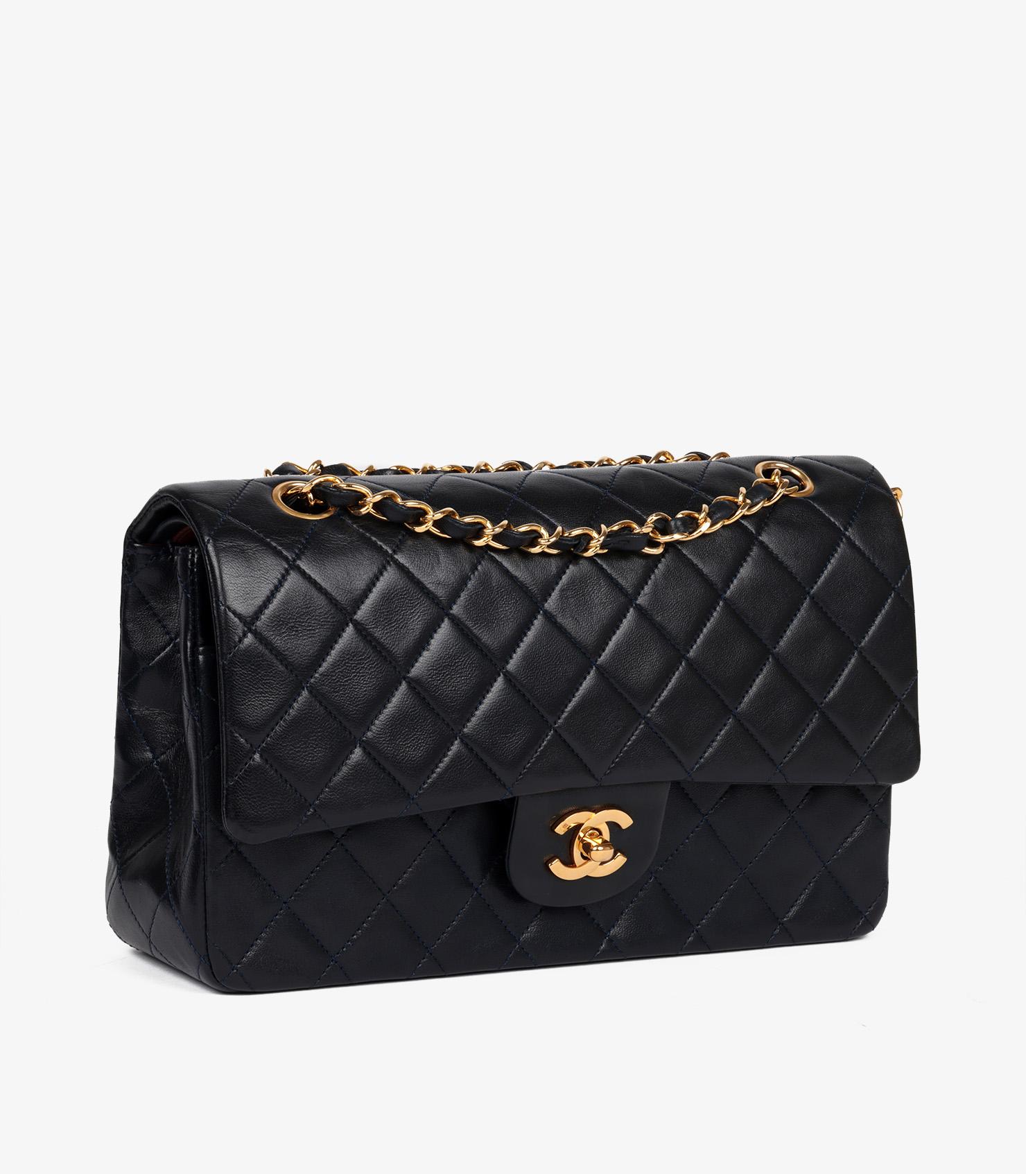 Chanel Navy Quilted Lambskin Vintage Medium Classic Double Flap Bag

Product Details
Xupes Ref: HB5587
Brand: Chanel
Model: Medium Classic Double Flap Bag
Type: Shoulder
Serial Number: 1628535
Age: 1991
RRP: £8,850
Accompanied By: Chanel Dust Bag,