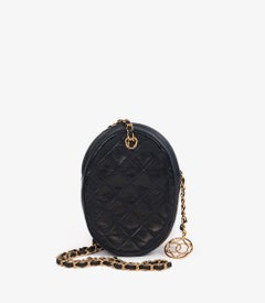 Chanel Piel de cordero acolchada azul marino Vintage Norte-Sur Mini bolso ovalado atemporal