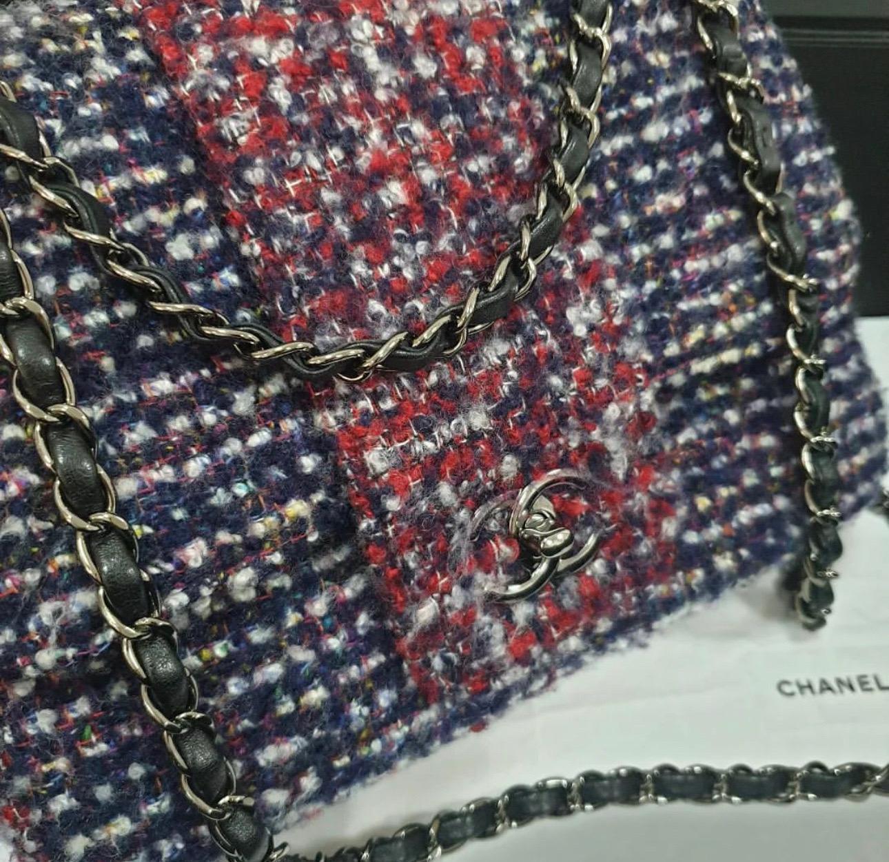 Chanel Pre-Fall 2015 Tweed Elementary Chic Flap Bag in burgundy, midnight blue and light grey Bouclé Tweed fabric featuring gunmetal hardware and an open pocket at the back.
 Opens with a classic CC turn-lock and is lined in black calfskin with one