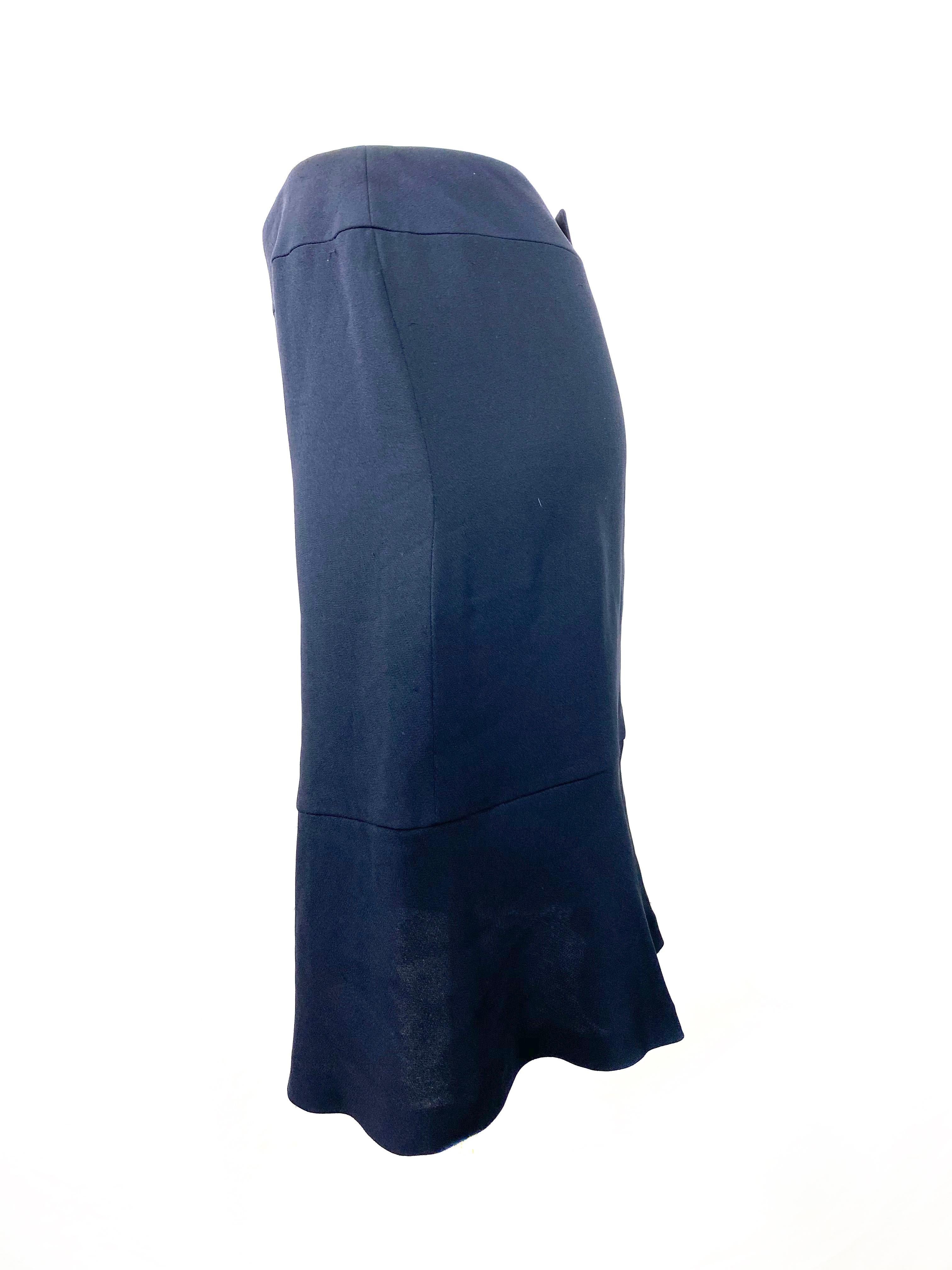 Product details:

Featuring, navy/ dark blue silk, mid knee length, rear buttons and sip closure, double silk lining.
Made in France.