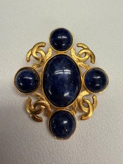 Chanel Navy Stone Brooch with four CCs across the brooch 95A