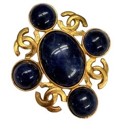Chanel Navy Stone Brooch with four CCs across the brooch 95A