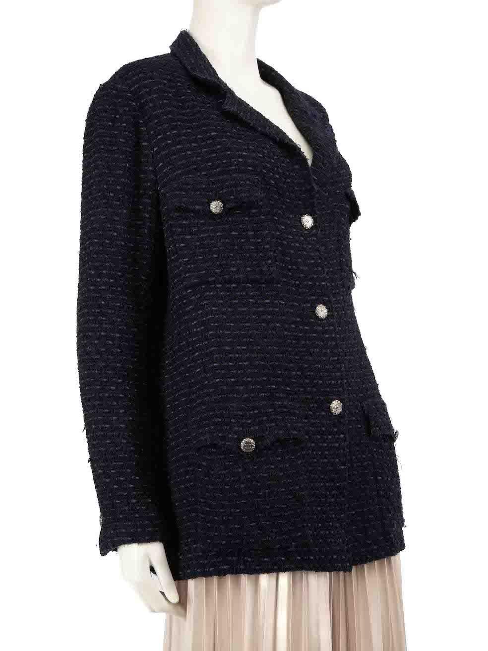 CONDITION is Good. General wear to jacket is evident. Fraying of the edges of the jacket and tarnishing of buttons, pulls to the weave on the right sleeve. Signs of repair to the inner lining and shoulder pads on this used Chanel designer resale