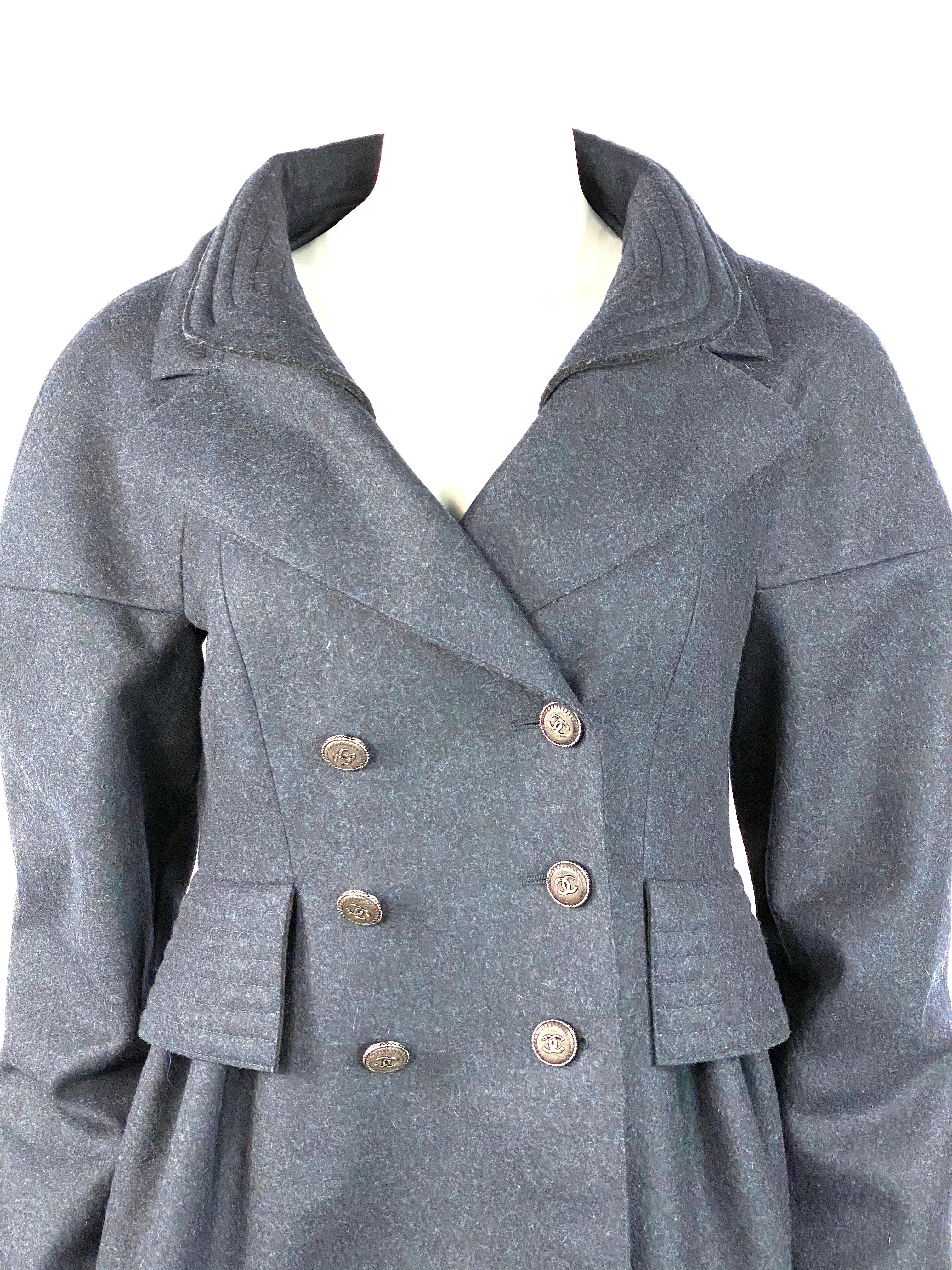 Chanel Navy Wool Short Length Coat Jacket w/ CC Buttons Size 40

Product details:
Size FR 40
Double lined w/ Chanel logo navy silk fabric 
Silver tone CC buttons
Front button closure 
Removable and adjustable inner collar
Imitated pockets on each