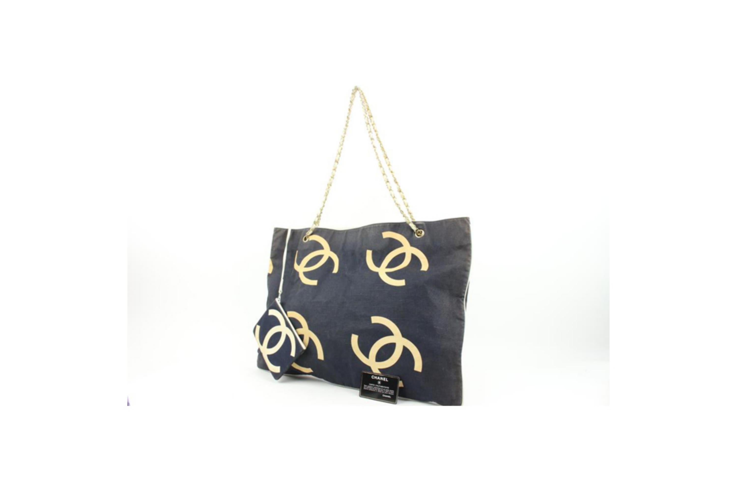 Chanel Navy x Beige Jumbo CC Chain Tote with Pouch 66c23s
Date Code/Serial Number: 0847140
Made In: Italy
Measurements: Length:  21.5