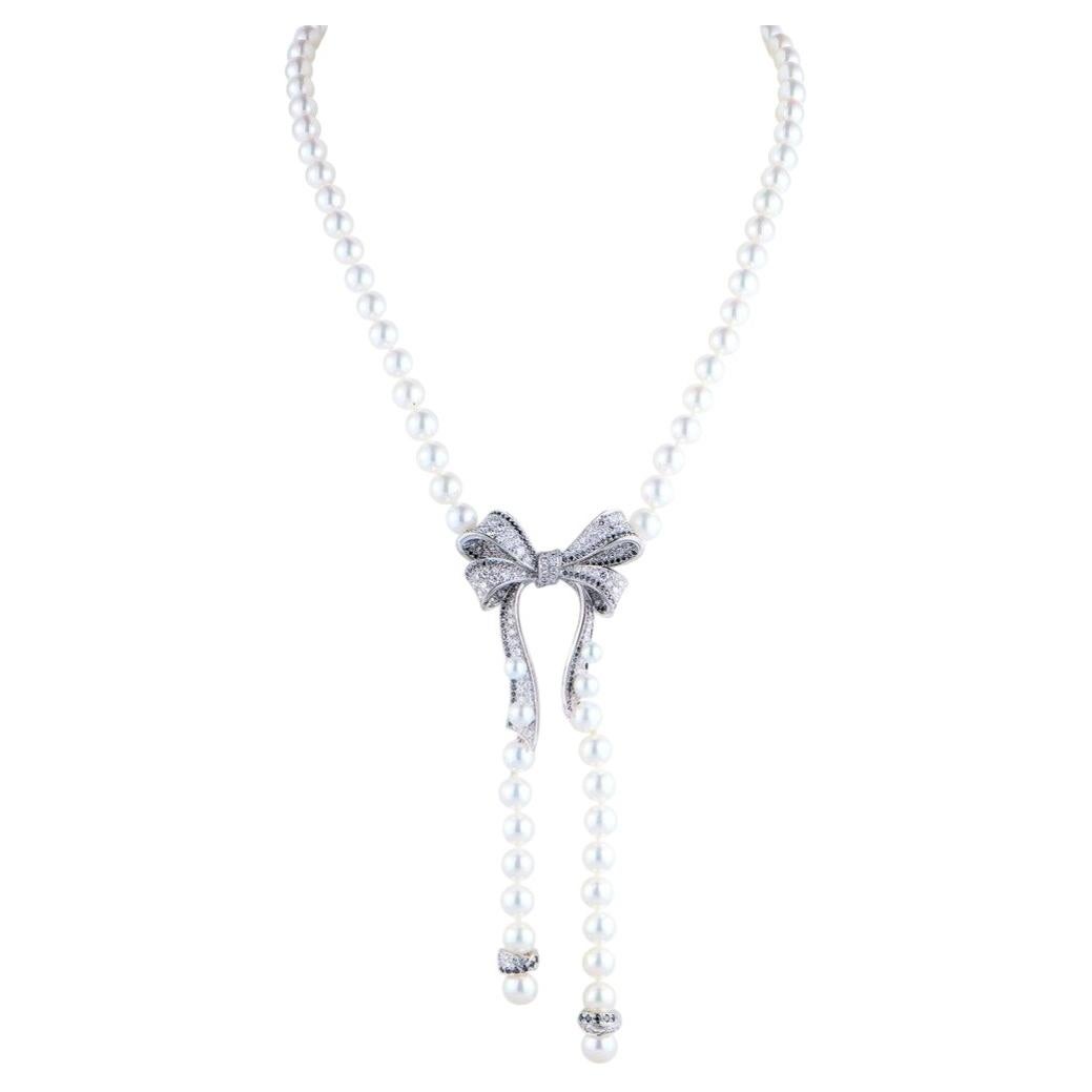 Chanel Collana Boucles de Camelia in oro bianco con diamanti e perle Akoya
