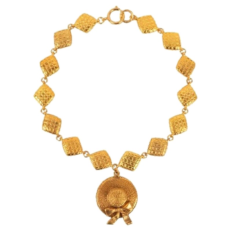 Chanel  Collana in metallo dorato con elementi trapuntati, anni '90