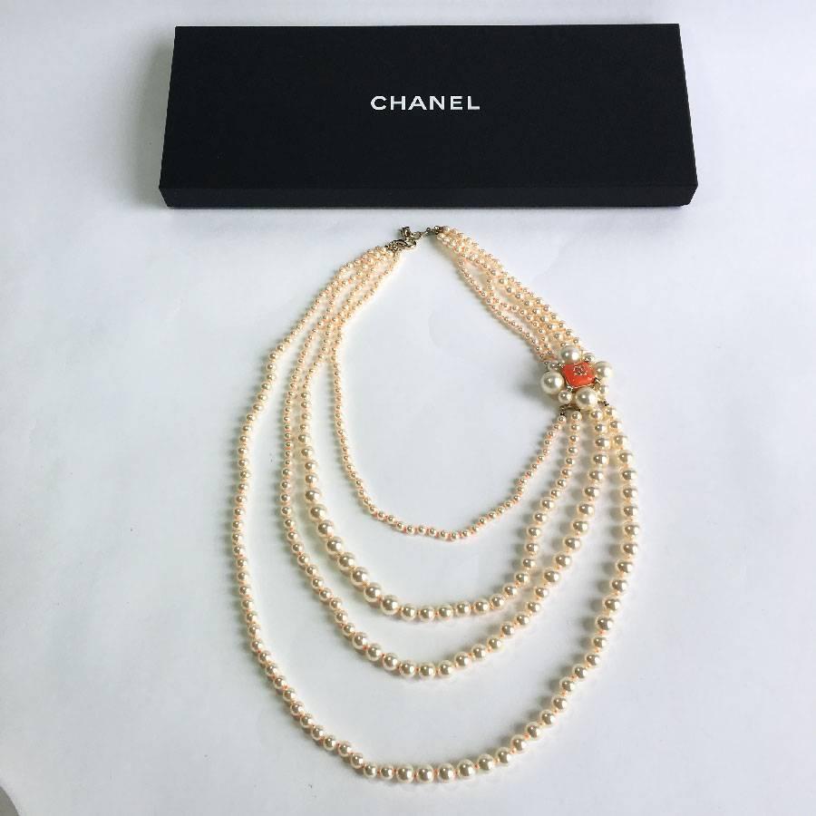 CHANEL Necklace in Pearls and Orange Molten Glass with Orange Fluorescent Nodes 1