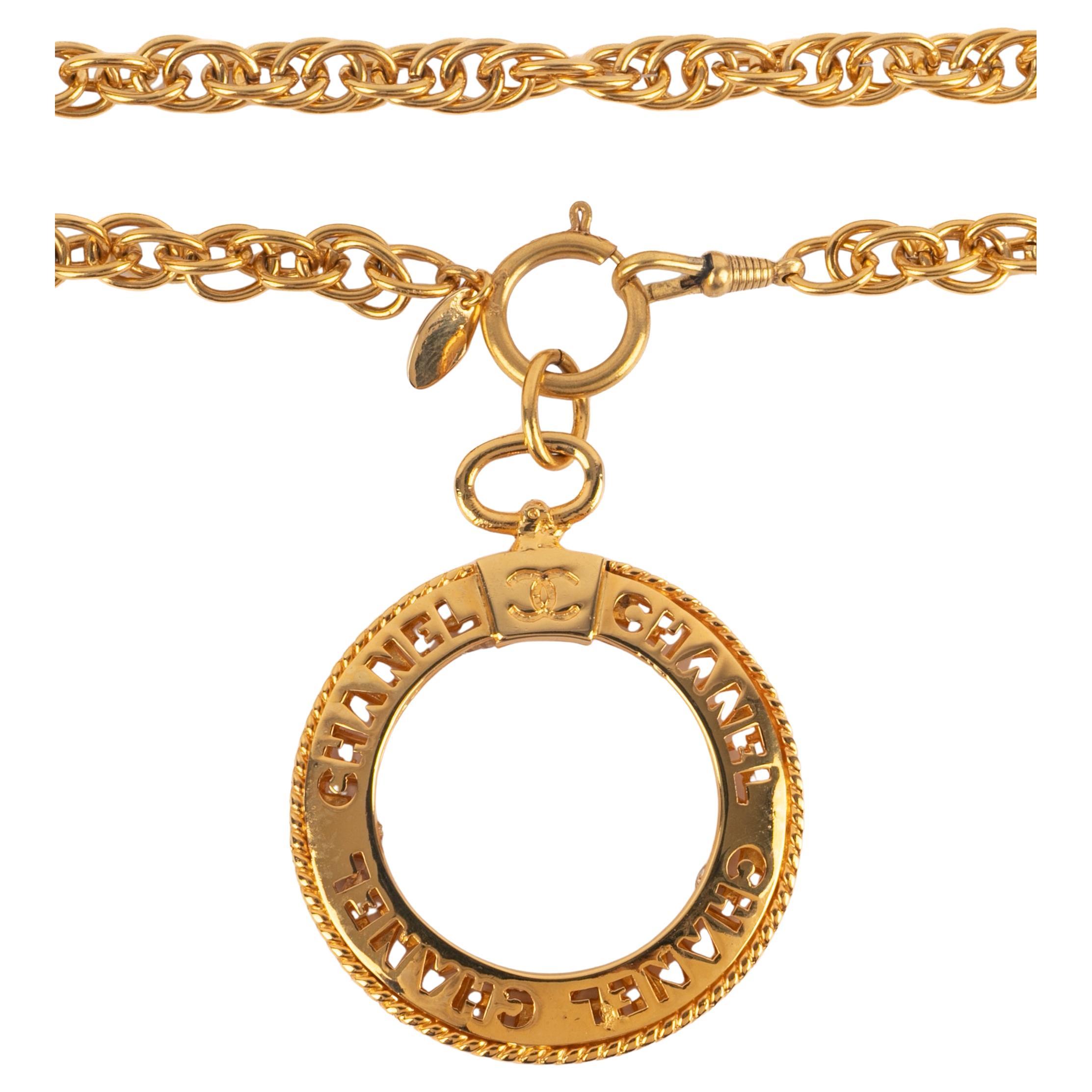 Collana Chanel con lente d
ingrandimento anni 
80