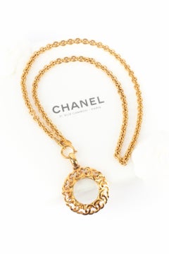 Chanel necklace magnifying glass